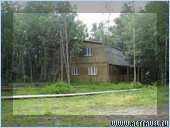 Соловки. Гостиница Причал. Корпус 2. Рядом баня и берег озера.